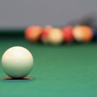 Sink white ball in pool